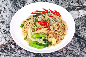 Sour and sweet fried Chinese noodle with vegetable