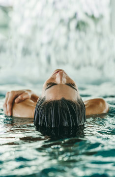 Beautiful Woman Relaxing in a Spa Center