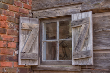 Window of old log farmhouse