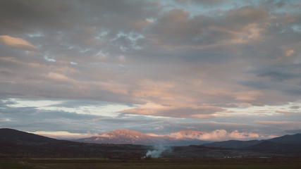 Countryside landscape with cloudy sky