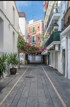 Typical Empty Street In Old Town Of Ibiza, Balearic Islands, Spain. Morning Light. Wide Angle