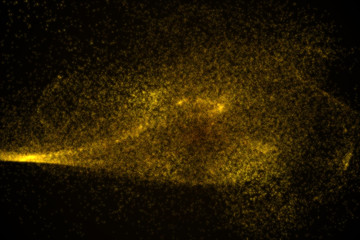 Abstract background made of yellow glowing particles