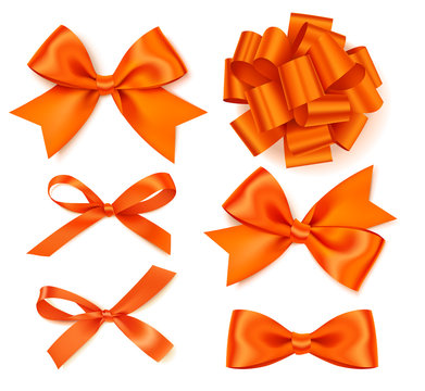Vector set of decorative orange bows isolated on white for autumn design