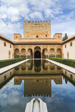 Comares tower reflected in the pond of the Court of the Myrtles