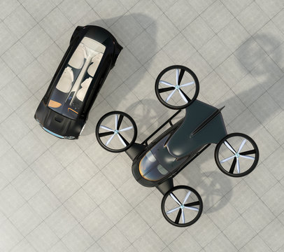 Top view of self-driving car and passenger drone parking on the ground. 3D rendering image