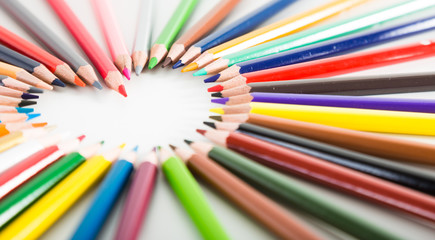 colored pencils lying around the heart