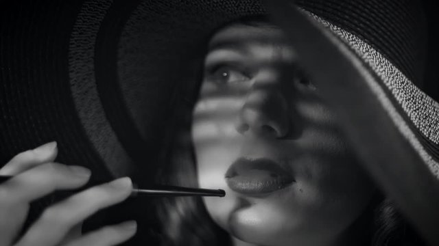 4k Woman Smoking with Cigarette Holder, black and white