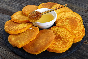 pumpkin pancakes with honey in center