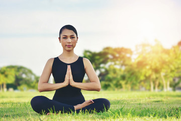 Fototapeta premium Beautiful women maintain health with yoga exercises.