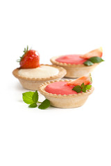 Tartlets with a delicate strawberry cream and fresh berries.
