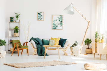 Green living room with pouf