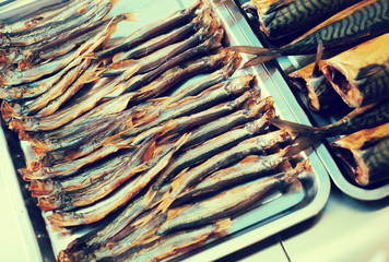 Smoked mackerel and other fish in food store