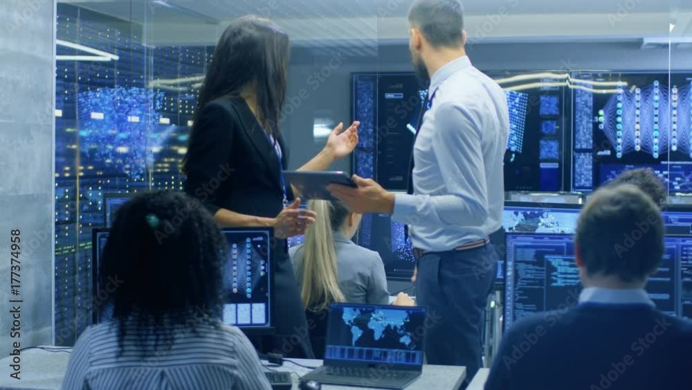 Fototapete Head of the Department and Project Manager Discuss Work Process Using Data on Tablet Computer. Multi-Ethnic Team Builds Neural Network