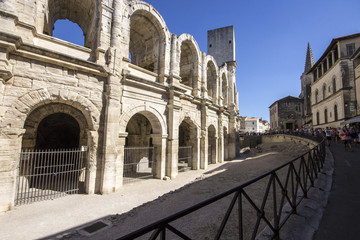 Fototapeta premium The Arles Amphitheatre (Arenes d'Arles in French), a two-tiered Roman amphitheatre in the southern France town of Arles. A World Heritage Site since 1981