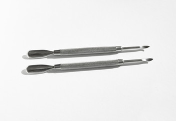 Two nail pushers for cuticle and nails care, manicure, pedicure tools