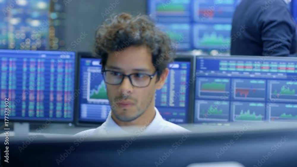 Aufkleber Multi-Ethnic Group of Stock Traders at the Stock Exchange Firm Office is Busy Selling and Buying Bonds and Shares, Talking to Each Other. Displays Show Relevant Graphs and Numbers.