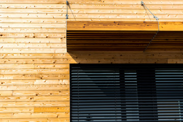 Wooden building with black window modern architecture