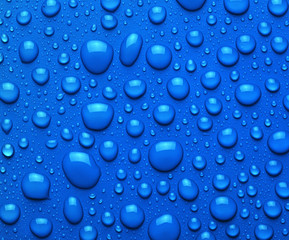 Droplets of liquid on blue surface