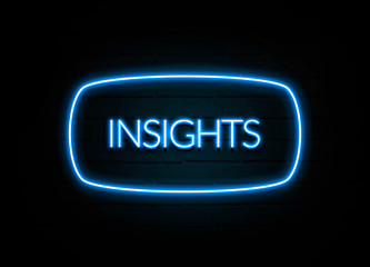 Insights  - colorful Neon Sign on brickwall