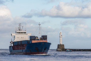 Cargo Ship Arriving at Port