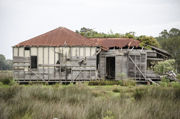 Deserted old wooden farm house
