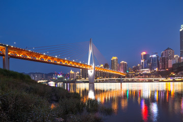 Fototapeta premium modern bridge and cityscape of modern waterfront city