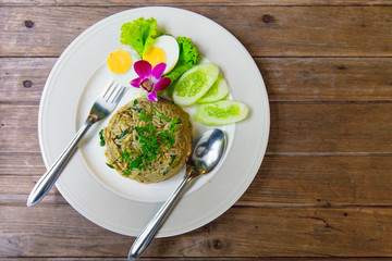 Green Curry Fried Rice Recipe Spicy and flavorful hot Thai kitchen food on wood table