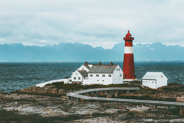 Tranoy Lighthouse Norway Landscape sea and mountains on background Travel scenery scandinavian...