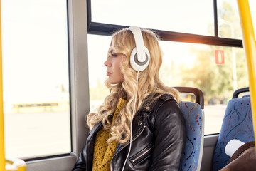 Fototapeta na wymiar woman listening music in headphones