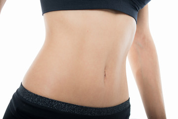 Close-up of fit or skinny girl abs