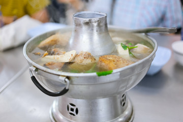 Chinese style taro and tofu mix soup hot pot in restaurant
