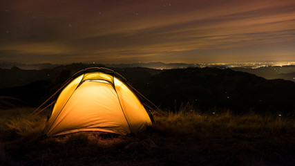 Fototapeta na wymiar long exposure of a tent in the swiss alps