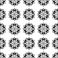Black floral seamless design on white background
