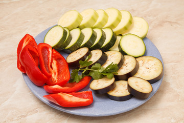 sliced zucchini, eggplant and peppers