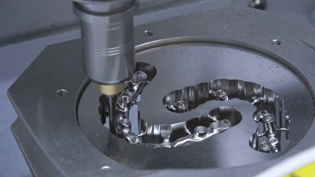 4K video footage of dry touch dental milling machine, stomatology equipment closeup process