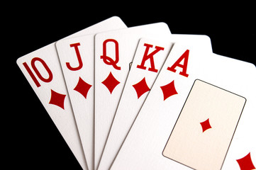 Close Up of Poker Hand Diamond Straight Flush