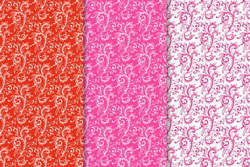 Set of pink floral ornaments. Vertical seamless patterns