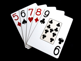 Poker Hand Straight on Black Background