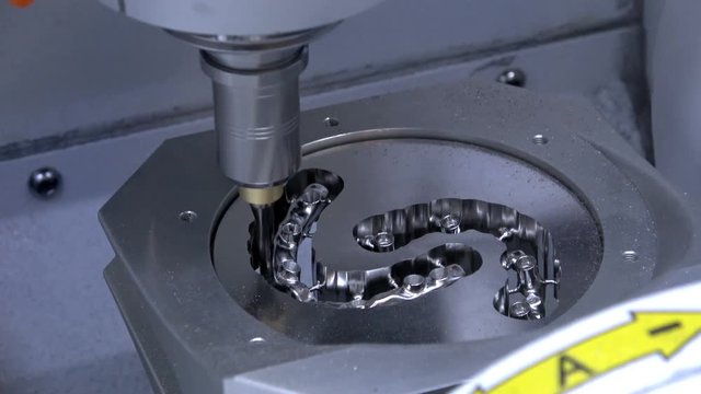 4K video footage of dry touch dental milling machine, stomatology equipment closeup process