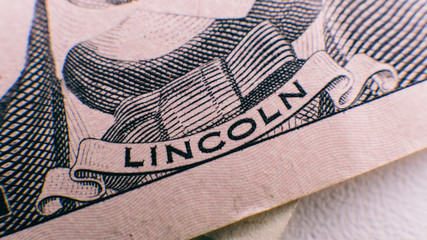 five dollars bill close-up. Five dollars in details
