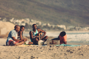 Friends on vacation relaxing at the beach