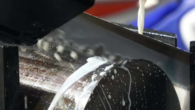 4K video footage of metalworking equipment, bandsaw machine, closeup metal processing