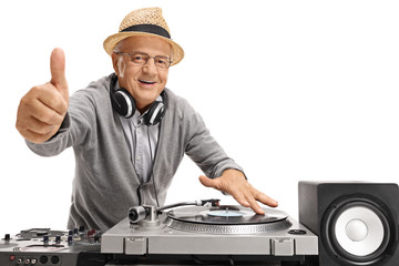 Old DJ making a thumb up gesture