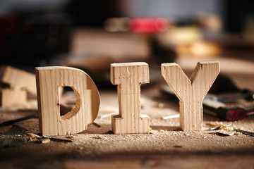 DIY written on a workshop table