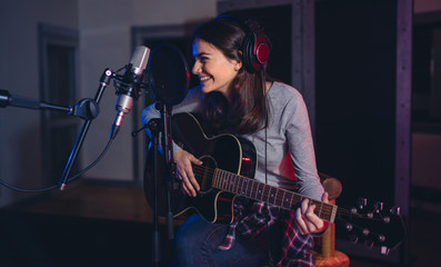 Professional musician recording in studio