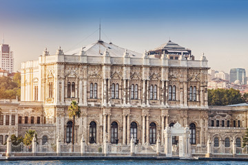 Fototapeta na wymiar Dolmabahce Palace view from Bosphorus strait in Istanbul Turkey from ferry on a sunny summer day