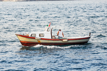 Small fishing boat in the Marmara Sea, Bosporus Strait in Istanbul