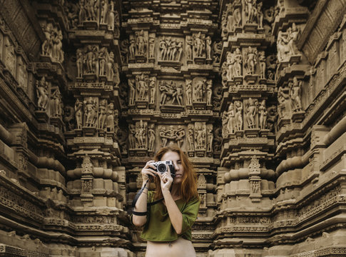 Woman Taking Photos At Kamasutra Temple
