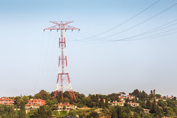 Electric power line on a hill with residential buildings in Istanbul, Turkey