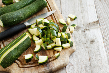 Fresh zucchini on wooden board